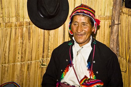 Close-up of a senior man smiling, Taquile Island, Lake Titicaca, Puno, Peru Stock Photo - Premium Royalty-Free, Code: 625-01753502