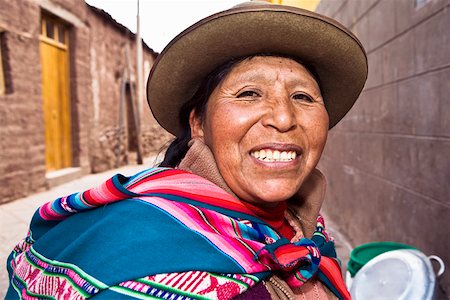 street portrait hispanic - Portrait of a mid adult woman smiling, Peru Stock Photo - Premium Royalty-Free, Code: 625-01753519