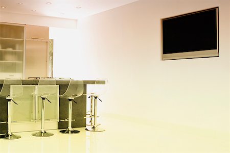 elegant kitchens - Kitchen in a studio apartment Stock Photo - Premium Royalty-Free, Code: 625-02265844