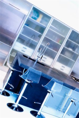 elegant kitchens - Kitchen in a studio apartment Stock Photo - Premium Royalty-Free, Code: 625-02265889