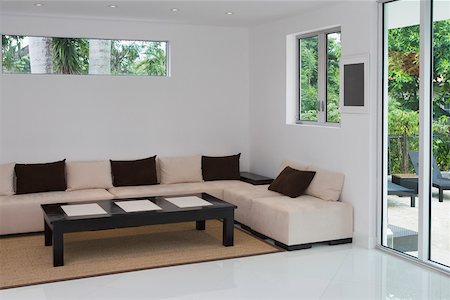 floor cushion sofa - Interiors of a living room Stock Photo - Premium Royalty-Free, Code: 625-02265900
