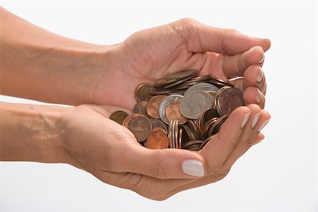 simsearch:625-02265907,k - Coins in a person's hands cupped Stock Photo - Premium Royalty-Free, Code: 625-02266023