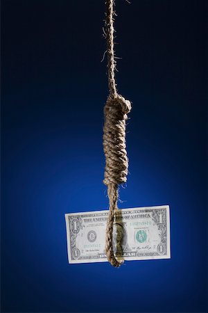One US dollar bill in hangman's noose Foto de stock - Sin royalties Premium, Código: 625-02266030