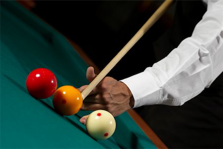 simsearch:625-02931506,k - Close-up of a man's hand playing snooker Stock Photo - Premium Royalty-Free, Code: 625-02266368
