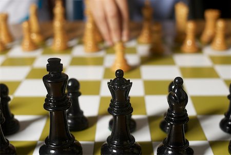 Close-up of chess pieces on a chessboard Stock Photo - Premium Royalty-Free, Code: 625-02266428