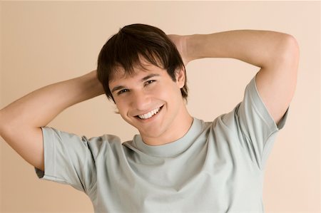 simsearch:625-02933219,k - Portrait of a young man smiling Foto de stock - Sin royalties Premium, Código: 625-02266498