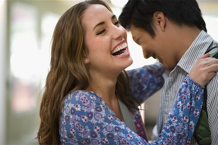 simsearch:625-02929666,k - Close-up of a young couple smiling Stock Photo - Premium Royalty-Free, Code: 625-02266492