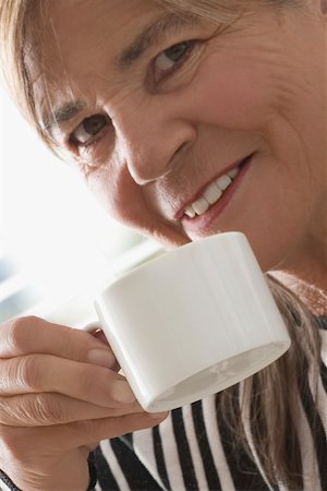 simsearch:625-02929093,k - Close-up of a senior woman having coffee Stock Photo - Premium Royalty-Free, Code: 625-02266617