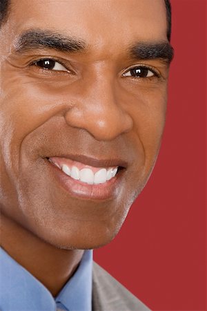 simsearch:625-02933219,k - Close-up of a businessman smiling Foto de stock - Sin royalties Premium, Código: 625-02266874