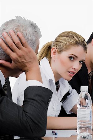 portraits old headshot caucasian business man white background - Two businessmen and a businesswoman at a meeting in a conference room Stock Photo - Premium Royalty-Free, Code: 625-02267025