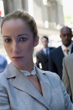 simsearch:625-02931241,k - Portrait of a businesswoman looking serious Fotografie stock - Premium Royalty-Free, Codice: 625-02267097