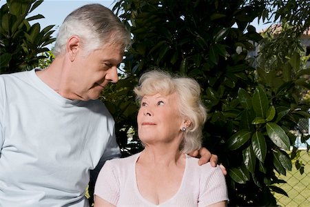 simsearch:625-00841593,k - Senior man with his arm around a senior woman Stock Photo - Premium Royalty-Free, Code: 625-02267130