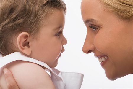 simsearch:625-02267507,k - Close-up of a mid adult woman smiling with her son Stock Photo - Premium Royalty-Free, Code: 625-02267318