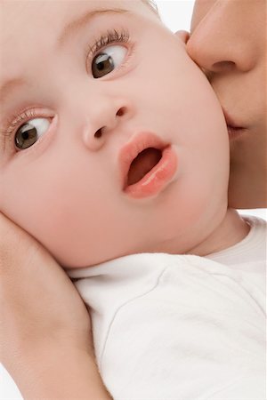 simsearch:625-02267467,k - Close-up of a mid adult woman kissing her son Stock Photo - Premium Royalty-Free, Code: 625-02267368