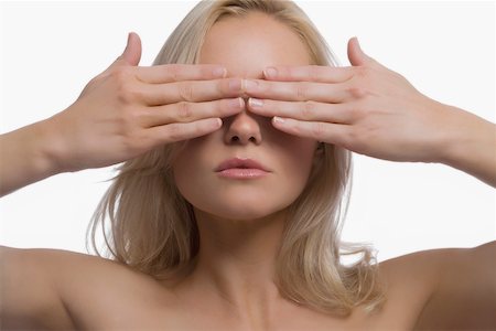 simsearch:625-02930713,k - Close-up of a young woman covering her eyes with her hands Stock Photo - Premium Royalty-Free, Code: 625-02267558
