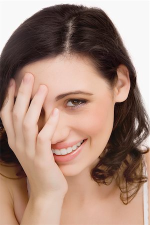 Portrait of a young woman smiling Stock Photo - Premium Royalty-Free, Code: 625-02267604