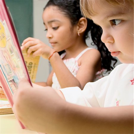 simsearch:625-02929760,k - Two students reading in a classroom Stock Photo - Premium Royalty-Free, Code: 625-02267615