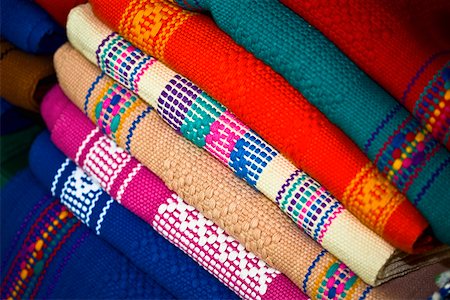 simsearch:625-02268046,k - Close-up of a stack of multi- colored shawls, Santo Tomas Jalieza, Oaxaca State, Mexico Foto de stock - Royalty Free Premium, Número: 625-02267932