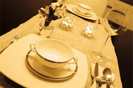 soup bowl napkin - Place setting on a dining table Stock Photo - Premium Royalty-Free, Code: 625-02926415