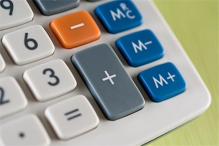 simbolo dell'addizione - Close-up of a calculator Fotografie stock - Premium Royalty-Free, Codice: 625-02926722