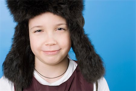 simsearch:625-02930383,k - Close-up of a girl wearing a fur hat Foto de stock - Sin royalties Premium, Código: 625-02926840