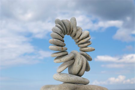 rocks balancing - Low angle view of arranged pebbles Stock Photo - Premium Royalty-Free, Code: 625-02927120