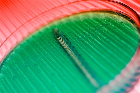 Close-up of a syringe with a petri dish Stock Photo - Premium Royalty-Free, Code: 625-02927233