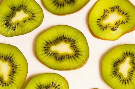 Slices of a kiwi fruit Stock Photo - Premium Royalty-Free, Code: 625-02927430