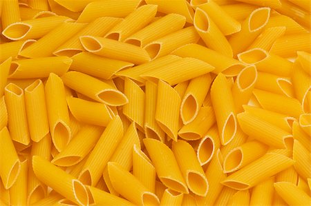 penne - Close-up of raw macaroni Foto de stock - Sin royalties Premium, Código: 625-02927487