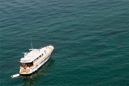 sorrento peninsula - High angle view of a tourboat in the sea, Bay of Naples, Sorrento, Sorrentine Peninsula, Naples Province, Campania, Italy Stock Photo - Premium Royalty-Free, Code: 625-02927508