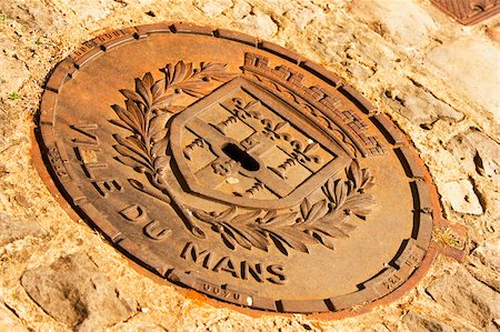 Close-up of a manhole, Le Mans, Sarthe, Pays-de-la-Loire, France Foto de stock - Royalty Free Premium, Número: 625-02927849