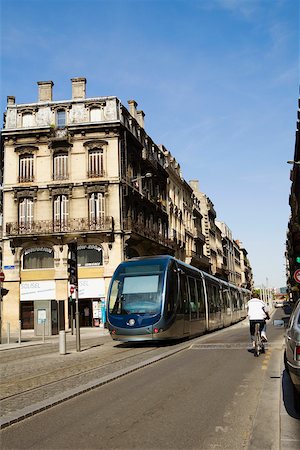 simsearch:841-02946336,k - Cable car on tracks in a city, Vieux Bordeaux, Bordeaux, France Stock Photo - Premium Royalty-Free, Code: 625-02927860