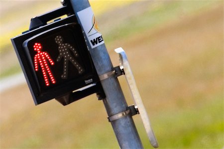 Close-up of an illuminated walk don't walk signal, Le Mans, France Foto de stock - Royalty Free Premium, Número: 625-02928019