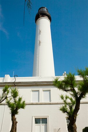 Low angle view of a lighthouse, Phare de Biarritz, Biarritz, Pays Basque, Aquitaine, France Stock Photo - Premium Royalty-Free, Code: 625-02928054