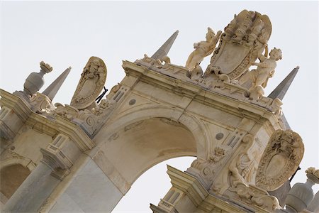 Low angle view of statues on a fountain, La Fontana dell'Immacolatella, Naples, Naples Province, Campania, Italy Stock Photo - Premium Royalty-Free, Code: 625-02928242