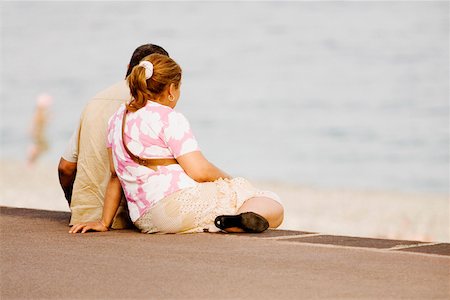 simsearch:625-02928309,k - Couple sitting on the beach, Promenade Des Anglais, Nice, Provence-Alpes-Cote D'Azur, France Stock Photo - Premium Royalty-Free, Code: 625-02928396