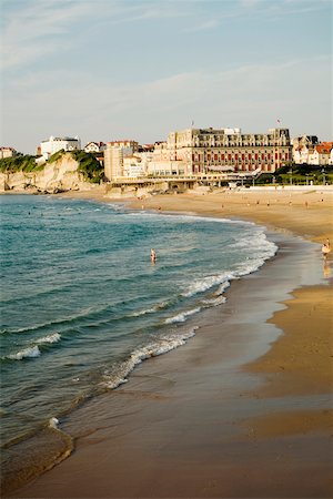seaside hotels building - High angle view of waves on the beach, Grande Plage, Hotel du Palais, Biarritz, France Stock Photo - Premium Royalty-Free, Code: 625-02928421