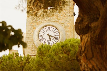 simsearch:625-02928282,k - Low angle view of a clock tower, Musee De La Castre, Cote d'Azur, Cannes, Provence-Alpes-Cote D'Azur, France Stock Photo - Premium Royalty-Free, Code: 625-02928528