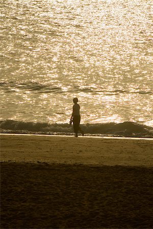 simsearch:625-02927605,k - Side profile of a person walking on the beach, Grande Plage, Biarritz, France Stock Photo - Premium Royalty-Free, Code: 625-02928667