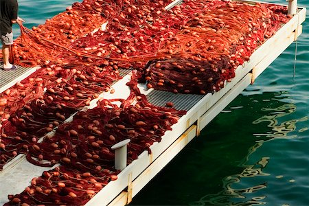 Fishing net on a pier, Marina Grande, Capri, Sorrento, Sorrentine Peninsula, Naples Province, Campania, Italy Stock Photo - Premium Royalty-Free, Code: 625-02928674