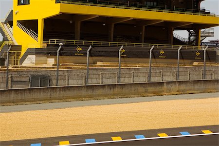 Chain-link fence along with motor racing track, Le Mans, France Stock Photo - Premium Royalty-Free, Code: 625-02928789