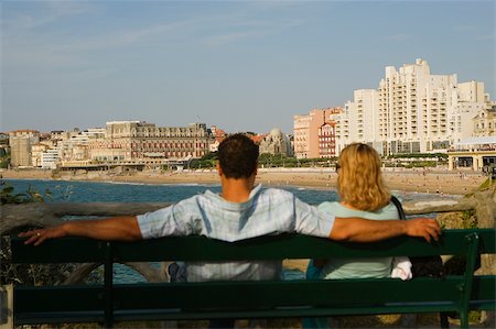 simsearch:625-02928309,k - Rear view of a couple sitting on a bench, Grande Plage, Hotel du Palais, Biarritz, France Stock Photo - Premium Royalty-Free, Code: 625-02928853