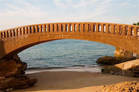 Arch bridge on the beach, Le Basta, Biarritz, France Stock Photo - Premium Royalty-Free, Code: 625-02928898