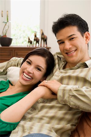 Portrait of a young couple smiling Stock Photo - Premium Royalty-Free, Code: 625-02929136