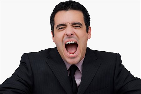 disdain - Close-up of a businessman shouting Stock Photo - Premium Royalty-Free, Code: 625-02929377