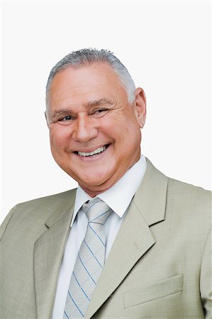 simsearch:625-02930851,k - Close-up of a businessman smiling Stock Photo - Premium Royalty-Free, Code: 625-02929424