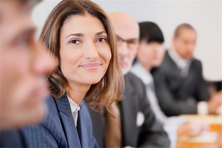 Portrait of a businesswoman smiling Stock Photo - Premium Royalty-Free, Code: 625-02929538