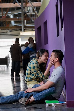 simsearch:625-02929730,k - Young couple romancing in a corridor Foto de stock - Sin royalties Premium, Código: 625-02929728