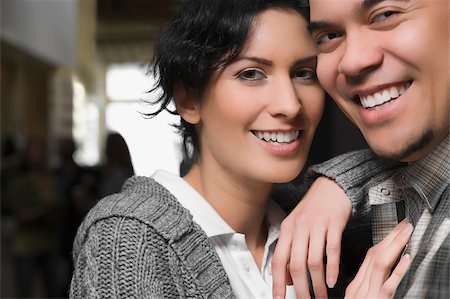 simsearch:625-02929666,k - Portrait of a young couple smiling Stock Photo - Premium Royalty-Free, Code: 625-02929808