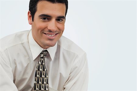 simsearch:625-02930851,k - Portrait of a businessman smiling Stock Photo - Premium Royalty-Free, Code: 625-02930016